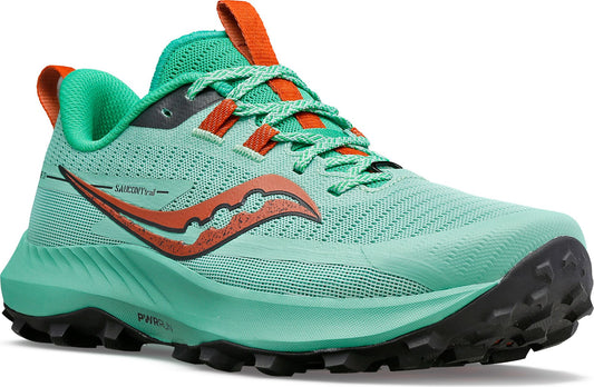 A green and orange trail running shoe with lugged outsole.