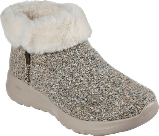 Sweater-knit upper slipper boot with faux fur trim and side zipper on a flexible sole.