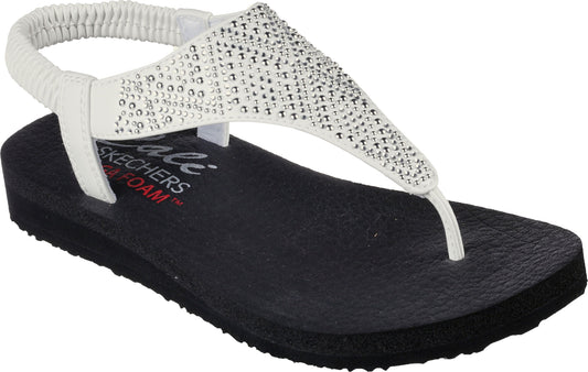 White thong sandal with rhinestone embellishments and elastic back strap.