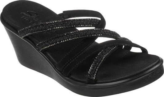 Black wedge sandal with beaded straps.