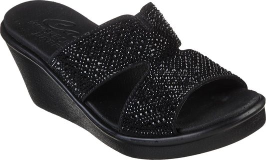 Black wedge sandal with two embellished straps.