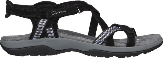 A black sandal with gray and white striped straps.
