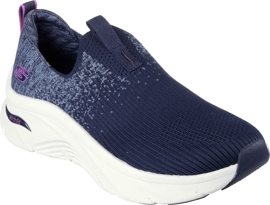 A navy blue slip-on sneaker with a white sole.
