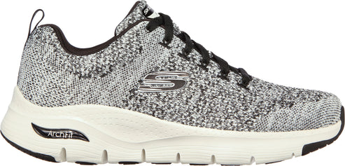 A grey and white walking shoe with black laces and a white sole with the word "Arch Fit" visible on the side.