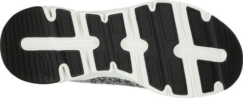 Bottom view of a shoe with a black and white sole.
