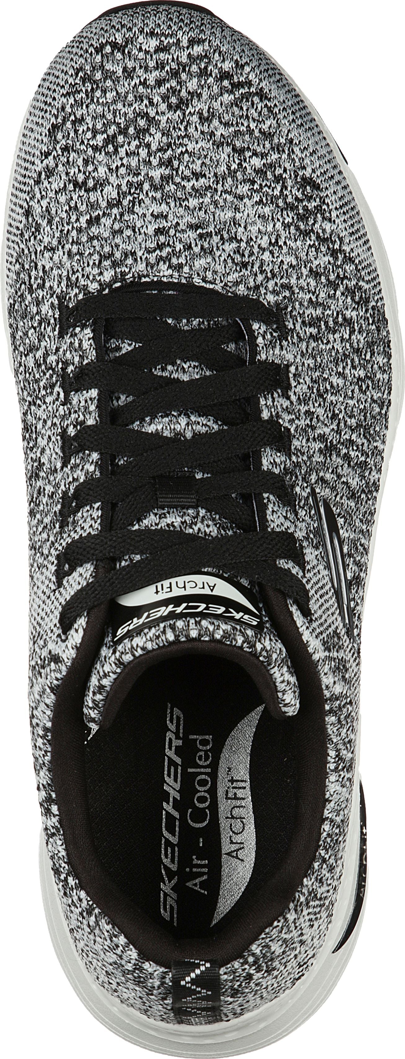 Overhead view of a sneaker with black laces and “SKECHERS Air-Cooled ArchFit” printed on the insole.