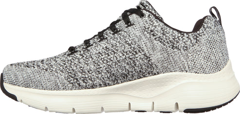 A low-top athletic shoe with a gray and black knit upper, black laces, and a white sole.
