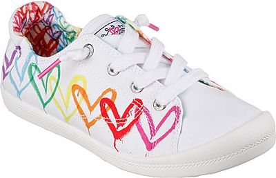 White slip-on sneaker with colorful hearts and white laces.