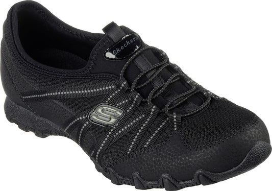 Black slip-on walking shoe with elastic bungee laces and "S" logo.