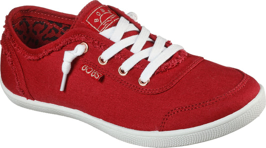 A red canvas sneaker with white laces, a white sole, and the word BOBS on the side.