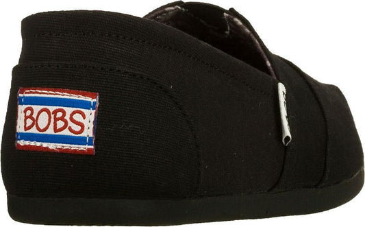 Black slip-on canvas shoe with BOBS logo patch.