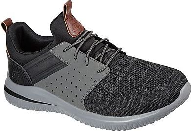 Black and gray athletic shoe with brown leather accents.