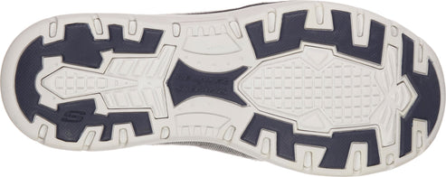 A shoe sole with a geometric tread pattern.