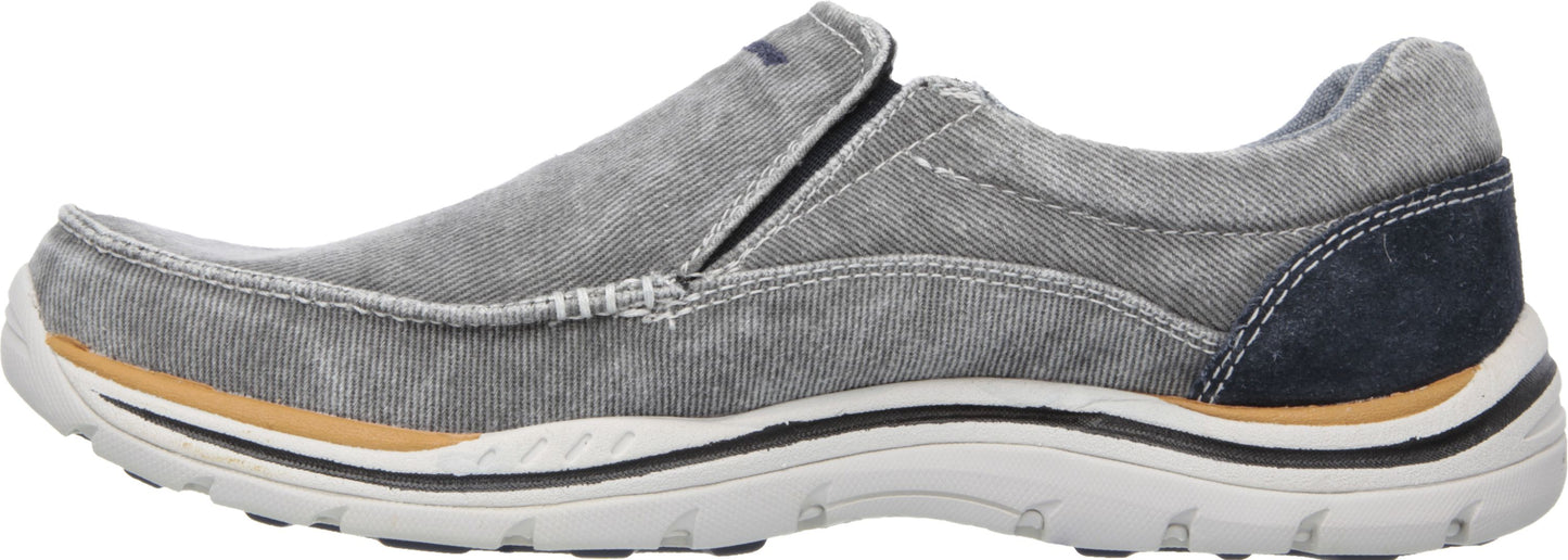 A gray slip-on casual shoe.