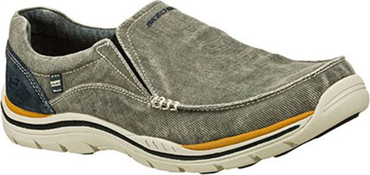 A gray slip-on shoe with a tan and black sole.