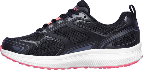 A running shoe featuring a black upper with pink accents.