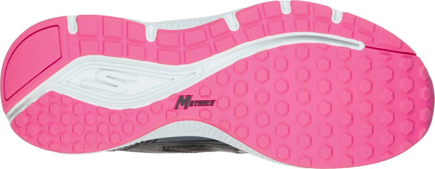 A pink shoe sole with a white design.