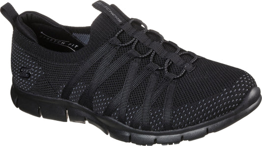 Black knit slip-on sneaker with elastic laces and black sole.