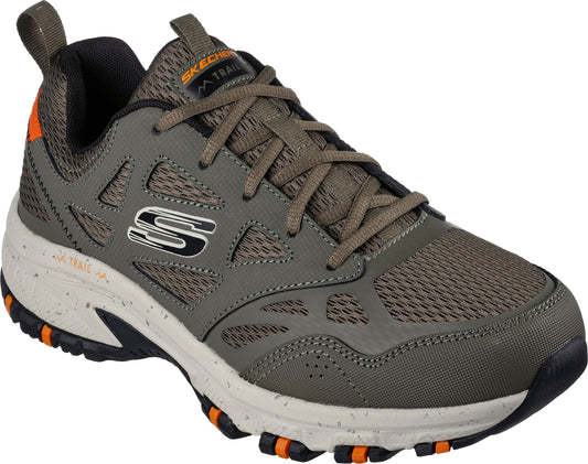 Gray hiking shoe with orange and black accents, lace-up closure, and a thick, speckled white midsole.