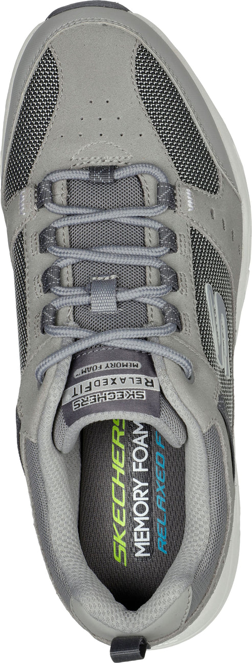 Top view of a gray shoe with laces, mesh fabric and relaxed fit memory foam.