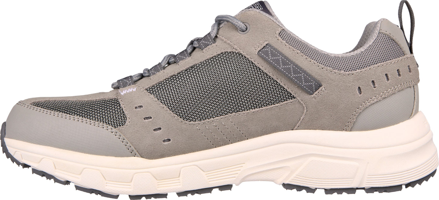 A gray walking shoe with a mesh upper and a thick, light-colored sole.