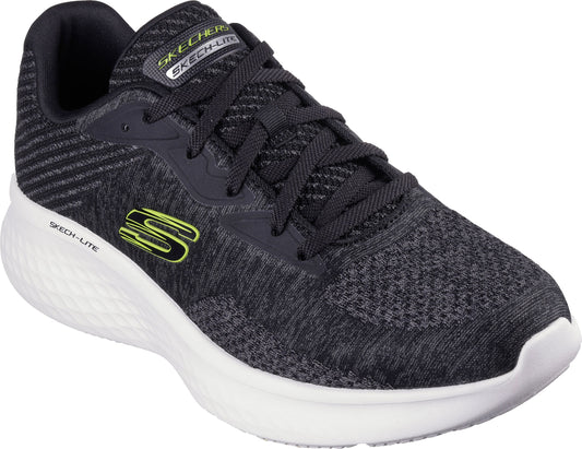 Athletic shoe, black and gray textured upper, black laces, white sole, visible yellow "S" logo and "SKECH-LITE" text.