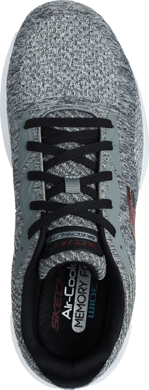 A gray running shoe with black laces.