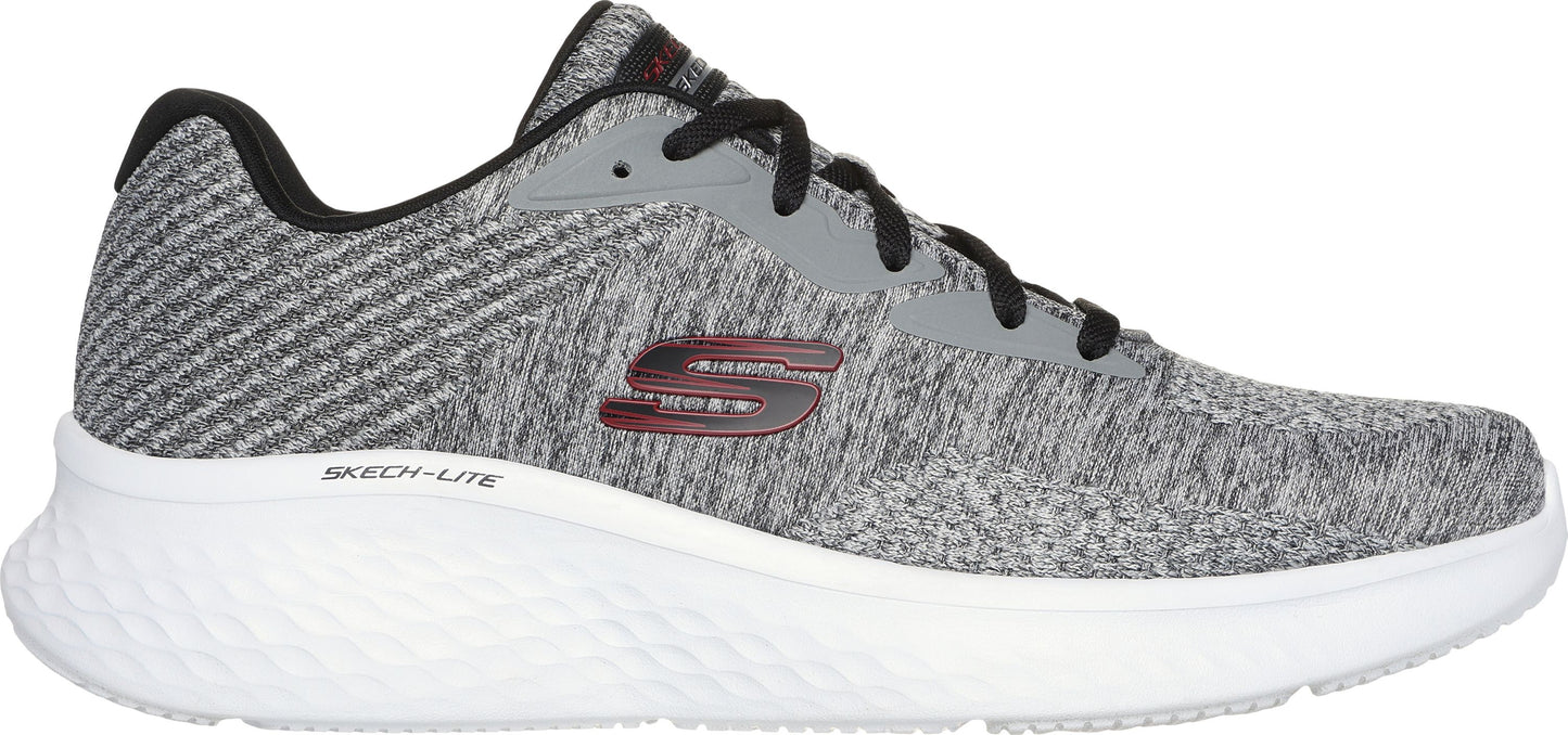 A running shoe with gray uppers, black laces and trim, a white midsole, and the text "SKECH-LITE" on the side.