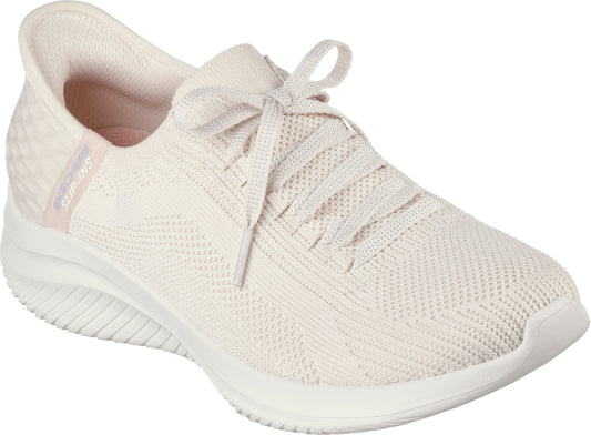 Close-up of a low-top, light-beige knit shoe with lace-up closure.