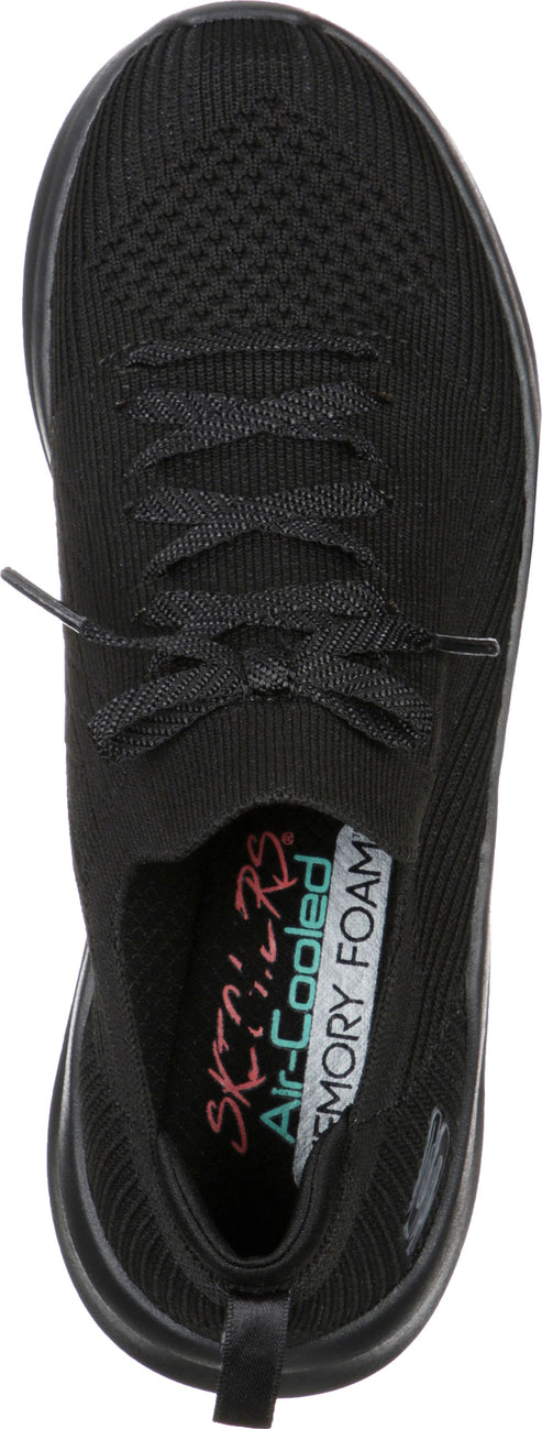 A black shoe with laces, showing the insole with the text: Skechers Air-Cooled Memory Foam.