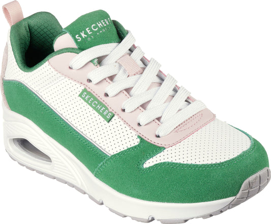 Green, pink and white athletic shoe with air cushioned heel, and white laces. The tongue has the word "SKECHERS".