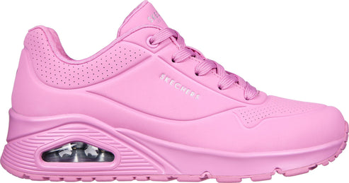 Pink sneaker with visible air cushion and laces. "SKECHERS" is printed on the side.