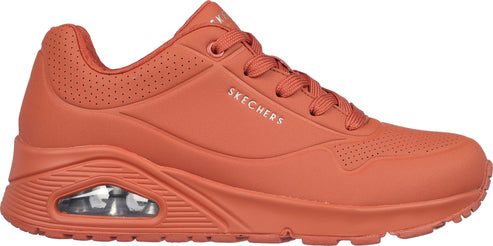 Orange sneaker with a white "SKECHERS" logo on the side.