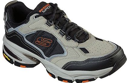 Low-top athletic shoe in gray, black and orange with black laces.