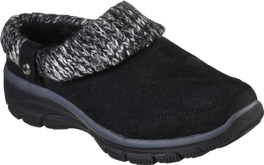 Black suede clog with black and white knit cuff and dark sole.