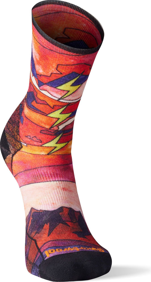 Ankle-high patterned sock with mountain and lightning bolt graphics.