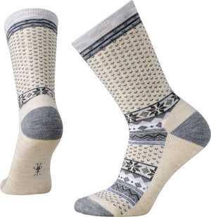 Pair of cream-colored socks with gray accents featuring snowflake and dot patterns.