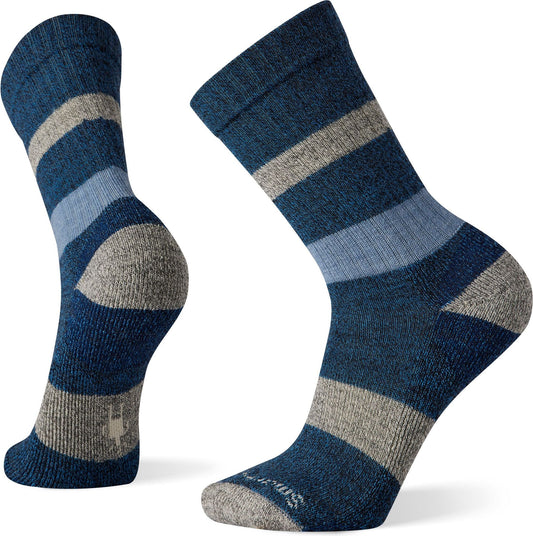 Two blue striped socks. One upright, one on its side.
