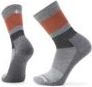 Pair of socks, gray with orange and black accents.