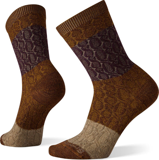 Pair of brown patterned wool socks; one is sideways showing the sole, toe, heel and leg.