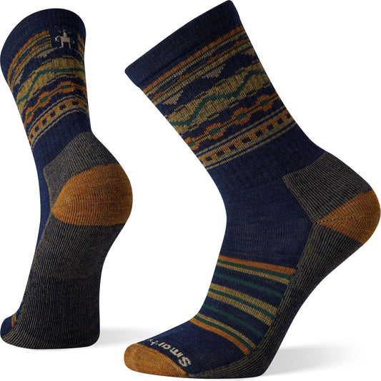 Two Smartwool dark blue wool socks with southwest style stripes on the upper and a dark gray heel and toe.