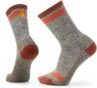 Two gray wool socks with red and brown stripes.