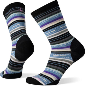 Pair of black, light blue, gray, and purple striped socks with a small logo on the cuff of one sock.
