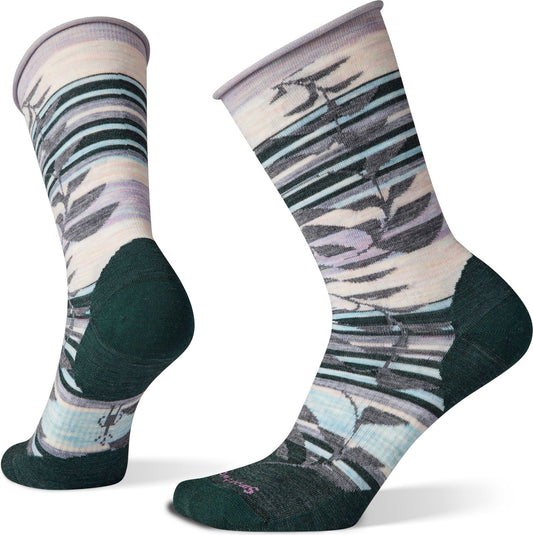 Two crew socks with floral and striped patterns, dark green heels and toes, light gray collars.
