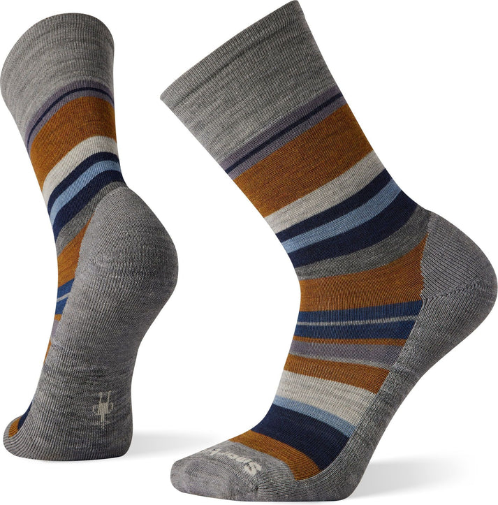 Two grey socks with brown, navy and light blue stripes.