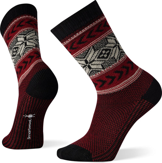 Pair of red, white, and black socks with a geometric design.