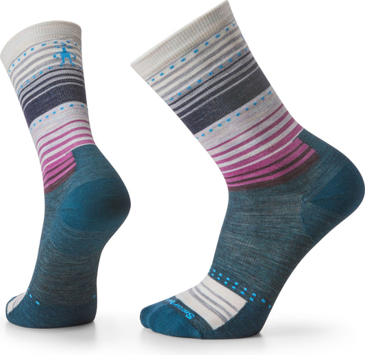 Two striped wool socks with a light-colored top and teal bottoms are displayed.