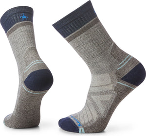 Two gray wool crew socks with dark blue toes, heel, and top band.