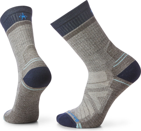 Two gray wool crew socks with dark blue toes, heel, and top band.