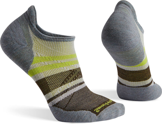 A pair of socks, one on its side and the other standing upright.  The socks are gray, with green and brown stripes.